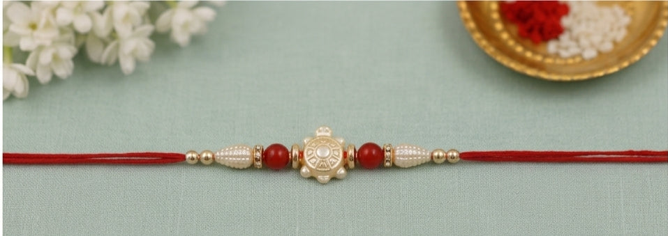 Pearl Aura Designer Rakhi with Red Beads PAD-RK-3401