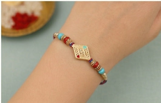 Evil Eye Designer Rakhi with Turquoise Beads RKH-EE-2026-003