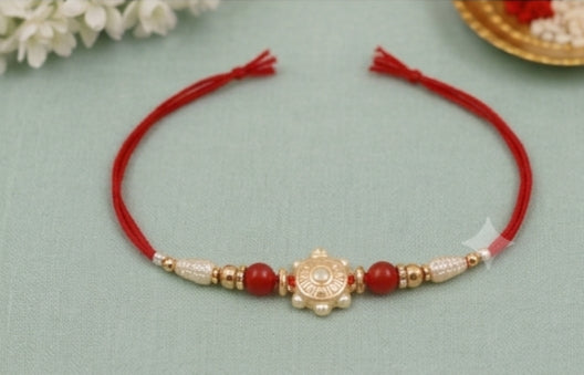 Pearl Aura Designer Rakhi with Red Beads  PAD-RK-3401