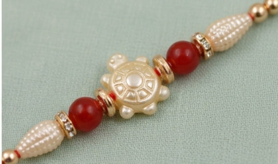 Pearl Aura Designer Rakhi with Red Beads  PAD-RK-3401
