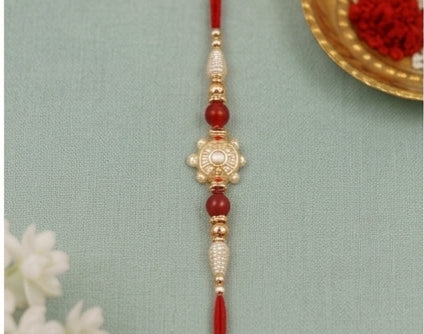 Pearl Aura Designer Rakhi with Red Beads  PAD-RK-3401